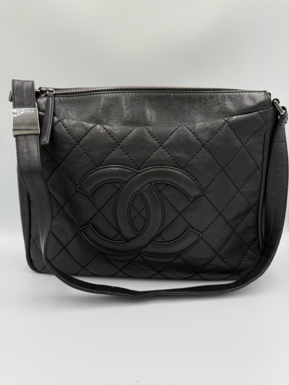 CHANEL Black Quilted Lambskin Shoulder Pouch with CC Applique